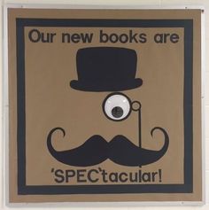 a sign that says our new books are spectaculair with a mustache and eye