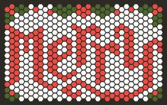 a cross stitch pattern with red and green flowers on black background, in the shape of hexagonal grids