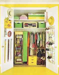 an open closet filled with lots of clothes and other items in yellow, green, and white