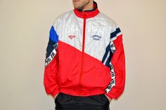 90s vintage Mizuno track jacket  - Item is used and vintage but still in a great condition. - Measurements: Pit to pit - 27,4" Lenght - 28,4" Sleeve from neck to the end - 33" Sleeve from pit to the end - 22" Fits like XL WORLDWIDE SHIPPING After shipping, I'll give you the tracking number! If you have some questions, please ask Best regards, Igor and Nazar Casual Red Moisture-wicking Track Jacket, Vintage Crew Neck Track Jacket For Sports, Retro Red Sports Windbreaker, Retro Red Windbreaker For Sports, Sporty Red Tracksuit For Streetwear, Sporty Red Cotton Track Jacket, 90s Red Sports Windbreaker, 90s Style Red Sports Windbreaker, 90s Style Red Windbreaker For Sports