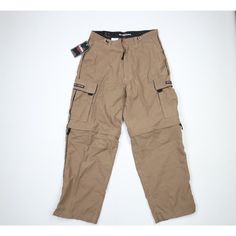 Nos Vtg 90s Streetwear Men L Convertible Baggy Wide Leg Cargo Pants Shorts Brown Mens Pants New With Tags Mens Size Large Measurements Are: 17 Inches Across The Waist Laid Flat 31 Inch Inseam 43.5 Inches From Top To Bottom 10.25 Inch Leg Open Brown Polyester Check Out My Other Items In My Store! Pr1561 Hh Summer Cargo Pants With Pockets For Hiking, Summer Hiking Cargo Pants With Cargo Pockets, Summer Hiking Cargo Pants With Pockets, Functional Outdoor Summer Pants, Functional Summer Outdoor Pants, Functional Summer Cargo Hiking Pants, Functional Summer Cargo Pants For Hiking, Casual Camping Bottoms With Multiple Pockets, Functional Summer Hiking Cargo Pants