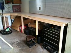 a workbench with lots of tools in it