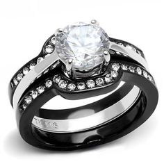 a black and white wedding ring set