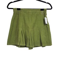 Urban Outfitters Womens Bdg Green Pleated Corduroy Mini Skirt Size Xs Nwt Urban Outfitters Bdg Pleated Corduroy Mini Skirt In Green. Side Zip Closure. Corduroy Material. No Stains Or Holes. Casual Y2k Corduroy Pleated Mini Skirt. Size: Xs Length: 13.25" Waist: 12.5" Condition: New With Tag Box 3 K/12/13pmerd Green High Waist Cotton Mini Skirt, High Waist Green Cotton Mini Skirt, High Waist Cotton Skort With Pleated Skirt, Chic Spring Corduroy Skirt, High-waist Pleated Cotton Skort, High Waist Green Cotton Skort, High Waist Green Cotton Skirt, Chic Corduroy Mini Skirt, Green Mini Cotton Bottoms