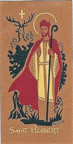 an icon with the image of saint luke in gold and red, on brown paper