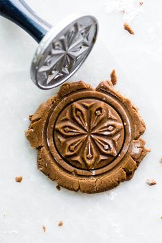 a cookie has been carved into the shape of a flower