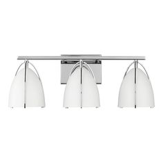 three light chrome finish bathroom fixture with white glass shades and four lights on each side