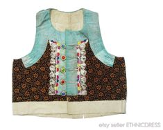 "Discounts available when buying 3 or more items in one shopping trip - please e-mail for a coupon code. Note that international shipping will be less that the posted amount when buying multiple items. Foreign buyers are encouraged to send an e-mail for an exact quote. ITEM DESCRIPTION: Gorgeous woman's folk costume vest from the village of Soporna, Pata or Hajske in western Slovakia. One of three similar vests that I currently have available from these villages, but this one is undeniably my fa Bohemian Sleeveless Vest With Buttons, Handmade Folk Style Vest For Festivals, Handmade Folk Vest For Festivals, Folk Style Fitted Festival Vest, Peasant Bodice, Folk Vest, Lace Art, Dragon Rider, Folk Dresses