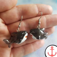 Cute Shark Resin Earrings: Make a Splash with Style Feel the ocean's allure and showcase your love for marine life with these absolutely adorable Cute Shark Resin Earrings. Designed to capture the essence of these magnificent creatures, these earrings are the perfect accessory for any sea-loving fashionista. Whether you're heading to the beach or simply want to add a touch of nautical charm to your everyday look, these earrings will make a splash wherever you go. Check out our Shark Earrings Col Penguin Bracelet, Crab Earrings, Black Shark, Shark Earrings, Nautical Looks, Cute Shark, Sea Lover, Sea Inspired, Ocean Lover