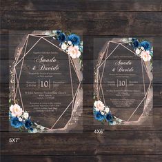 two wedding cards with blue and white flowers on them, in front of a wooden background