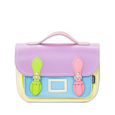 This fantastic multicoloured pastel midi satchel is carefully handmade in England from the best quality leather, using traditional expert craftsmanship. It has each panel cut from different leather to create a real kaleidoscope of colour. The strap is adjustable and detachable allowing the bag to be worn on your shoulder, cross-body or carried as a clutch. Featuring Pink, Cream, blue, green & violet leathers. This cute bag is just a must-have for those looking for a smaller 9 inch version of our Funky Purses, Small Suitcase, Bag Suitcase, Carry On Suitcase, Mobile Phone Bag, Women Accessories Bags, Casual Backpack, Cute Bag, Leather Satchel