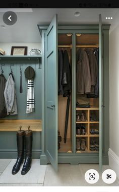 an image of a closet with shoes and coats