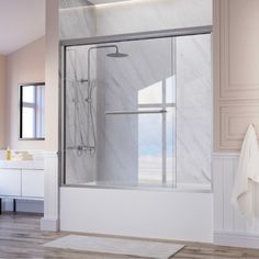 a bathroom with a walk in shower next to a sink