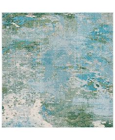 an abstract rug with blue and green colors