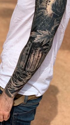 a man with a tattoo on his arm