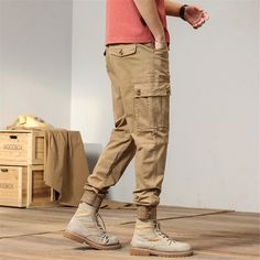 Applicable Season: Spring and Autumn tyle: Cargo Pants Style: Safari Style Thickness: Midweight Waist Type: MID Decoration: NONE Gender: MEN Item Type: Full Length Closure Type: Elastic Waist Fabric Type: Broadcloth Length: Full Length Front Style: Flat Fit Type: Regular Cargo Pants Style, Safari Style, Pants Style, Pencil Pants, Cargo Pants Men, Pants Men, Spring And Autumn, Cotton Pants, Fashion Pants