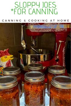 several jars filled with food sitting on top of a counter