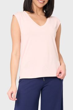 This soft and drapey knit top can easily be dressed up or down and is sure to become your favorite V-Neck of the season. 74% Modal | 26% Polyester Delicate Wash Cycle, Dry Flat. Length 24" (size small) Sabrina is 5'7 and wearing XXS in Blush. Versatile V-neck T-shirt For Loungewear, Versatile V-neck Tank Top For Loungewear, Feminine Stretchy Loungewear Top, Casual V-neck Tank Top For Loungewear, Pink V-neck Knit Top, Chic Relaxed Fit Tops Made Of Modal, Feminine Relaxed Fit V-neck Tops, Chic Relaxed Fit Modal Tops, Feminine V-neck Tops With Relaxed Fit