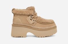 This is *the* perfect city shoe for you. Just hear us out. The curly sheepskin and UGG®plush lining provide comfort, while its lace-up and platform silhouette add height to your everyday style. | Suede, 10mm curly sheepskin upper. 17mm curly UGG®plush 60% upcycled wool, 40% TENCEL Lyocell vamp lining. 17mm UGG®plush 60% upcycled wool, 40% TENCEL Lyocell sockliner. Foam footbed. Sugarcane EVA outsole. Textile binding made from 100% recycled polyester fibers. 2.75 inch platform height. Nubuck heel Ugg Tennis Shoes, Ugg Snow Boots, Boots Slippers, Ugg Classic, Logo Label, Classic Boots, Winter Essentials, Real Fur, Tall Boots