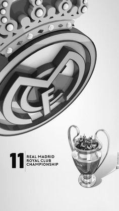 the real madrid football club trophy is displayed next to it's official logo,