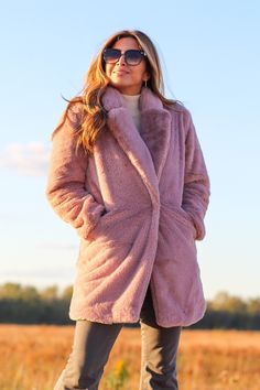 Stay cozy while looking fabulous in this essential mauve faux fur coat! Featuring two front pockets and a snap closure. -Color: Mauve -Snap closure -Front pockets -Lined -Content: 100% Polyester -Imported -Body length: 33" -Runs true to size -Model is 5'5" 36-30-40 and wearing a size Small Faux Mink Coat, Sequin Knit, Faux Fur Hooded Coat, Unique Clothes For Women, Mink Coat, Pink Mauve, Long Sleeve Sequin, Teddy Coat, Knit Turtleneck