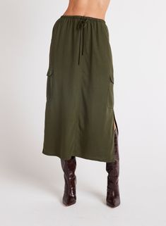 This Cargo Midi Skirt is a versatile addition to any wardrobe, featuring side slits for ease of movement and practical pockets for convenience. Made from soft Tencel fabric, this skirt is not only comfortable to wear but also stylish in beautiful colors. 100% TENCEL™Lyocell. Casual Long Skirt With Side Pockets, Utility Style Long Skirt With Cargo Pockets, Casual Full-length Skirt For Workwear, Fall Full-length Maxi Skirt With Pockets, Spring Bottoms With Pockets And Split Hem, Fall Full Length Maxi Skirt With Pockets, Utility Long Skirt With Pockets, Casual Long Cargo Skirt With Side Pockets, Casual Relaxed Fit Maxi Skirt With Side Slits