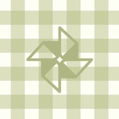 an arrow pointing to the left on a green and white checkered tablecloth background