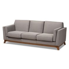 a gray couch with wooden legs on a white background