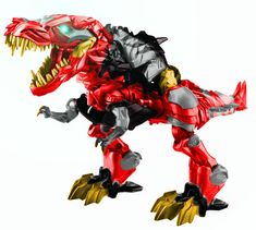 a toy dinosaur that is red and yellow