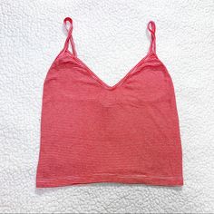 Brandy Melville Red And White Striped Joanne Tank Only Worn/Washed A Few Times No Flaws Or Signs Of Wear Nwot Condition! Not Interested In Trading Will Be Cleaned Before Shipping! I Reuse Packaging To Be Eco Friendly, But Let Me Know If You Want Cute Packaging! The Pics Are My Own :) Casual Red V-neck Tank Top, Red Seamless Tank Top For Spring, Red Cami Tank Top For Summer, Red Fitted Tank Top For Vacation, Fitted Red Tank Top For Vacation, Red Cami Tank Top For Beach, Trendy Red V-neck Tank Top, Red Seamless V-neck Top, Red Summer Cami Top