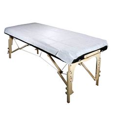 a portable table with blue cloth on it