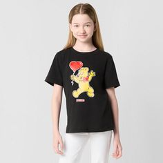 Part of the JCPenney x HARIBO limited-time collection, with the addition of this golden bear heart graphic t-shirt, your little or big girl's wardrobe will be as adorable as she is. Cut in a classic-fit, it's made from soft, stretch, cotton-jersey with a crew neckline and short sleeves. Wear it with everything from shorts to jeans.Features: Easy CareClosure Type: Pullover HeadFit: Classic FitNeckline: Crew NeckSleeve Length: Short SleeveApparel Length: 20 InchesFiber Content: 68% Cotton, 27% Pol Casual Crew Neck T-shirt For Playwear, Fun Graphic Print T-shirt For Playwear, Playful Short Sleeve Tops For Streetwear, Casual T-shirt With Letter Print For Play, Playful Graphic Print Tops For Streetwear, Casual Letter Print T-shirt For Play, Graphic Tee Tops With Letter Print For Playwear, Trendy Graphic Print T-shirt For Playwear, Black T-shirt With Graphic Print For Casual Wear