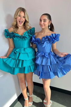 This Hot Pink Off the Shoulder Ruffle A-Line Homecoming Dress exudes confidence and elegance. The vibrant color and trendy off-shoulder design are perfect for standing out at any homecoming event. You'll feel comfortable and stylish in the ruffled A-line silhouette. Make a statement with this stunning dress! Spring Prom Off-shoulder Dress With Ruffles, Elegant Blue Off Shoulder Dress With Ruffles, Spring Prom Off Shoulder Dress With Ruffles, Blue Ruffled Off-shoulder Dress, Off-shoulder Bridesmaid Dress With Ruffles, Spring Off Shoulder Ruffled Dress For Prom, Off-shoulder Ruffled Prom Dress, Ruffled Off-shoulder Dress For Prom Season, Prom Off-shoulder Ruffle Dress