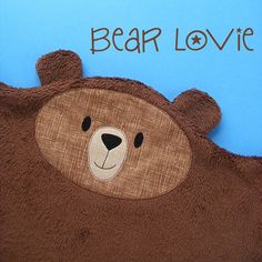 a brown teddy bear with the words bear love on it