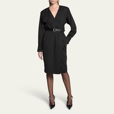 Saint Laurent wrap dress featuring a leather belt and gathered waist seam Surplice neckline Long sleeves; button cuffs Side slip pockets Sheath silhouette Knee length Hidden closure Viscose Professional cleaning recommended Made in Italy V-neck Belted Midi Dress For Office, V-neck Belted Dress For Work, Fitted V-neck Belted Dress For Daywear, Classic V-neck Blazer Dress For Work, Chic V-neck Midi Dress For Business, V-neck Belted Blazer Dress For Formal Occasions, V-neck Belted Blazer Dress For Formal Events, V-neck Belted Dress For Office, Classic Belted Midi Dress For Office