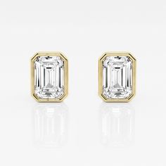 Emerald cut lab grown diamond stud earrings. A popular European style, these diamonds are wrapped in a high polished bezel setting. Expensive Diamond, Fake Diamond, Solitaire Studs, Moissanite Earrings, Diamond Stud Earrings, Diamond Stud, Emerald Cut Diamonds, Bezel Diamond, Brilliant Diamond