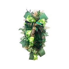 a green and gold christmas wreath on a white background