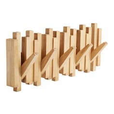 several pieces of wood are lined up in the shape of bars on a white background