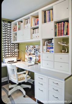 a home office with bookshelves, desk and chair in front of the window