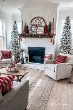 a living room decorated for christmas with red and white decor