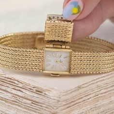 We love a jewel that is both beautiful and functional! We love how this mesh bracelet appears like any other bracelet out there but a quick flip of the lid opens to reveal a slender watch underneath. Chic, elegant, and a perfect addition to any jewelry wardrobe. 14kt yellow gold, 6.7” in length, 24.9 pennyweights.Diamonds are estimated H/I colors, VS clarities, GIA standards.Please see qualitative report for more information. Engagement Watch, Modern Mens Rings, Art Jewelry Earrings, Fancy Watches, Jewelry Wardrobe, Bespoke Rings, Jewel Necklace, Antique Watches, Mesh Bracelet