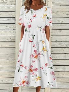 SPU:E5NDR57D5E7Sleeve Length:Short sleeveEdition type:LooseWaistlines:NaturalElasticity:Micro-ElasticityDress type:T-Shirt DressSilhouette:A-LineThickness:LightweightMaterial:PolyesterActivity:DailyNeckline:Crew NeckPattern:FloralTheme:SummerStyle:CasualColor:WhiteSize:S,M,L,XL,XXLFabric:Polyester95%; Spandex5%Size Chart SizeSleeve Length Shoulder Length Bust cminchcminchcminchcminchS249.437.714.811746.19637.8M24.59.63915.411946.910139.8L259.840.315.912147.610641.7XL25.51041.616.412348.411143... Flowy Dress Long, Streetwear Dress, Prom Dresses Vintage, Floral Dresses Long, Midi Short Sleeve Dress, Crewneck Dress, Prom Dresses Long With Sleeves, Printed Shift Dress, Vestido Casual