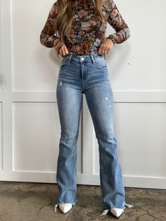 Get ready to hit the town in these Nashville Trip High Rise Flare Jeans! Featuring a light wash, high rise fit, and a fun frayed hem, these jeans are perfect for any occasion. With functional pockets and belt loops, these jeans are both stylish and practical. Made with comfortable washed denim, these jeans are perfect for exploring the city or rocking out at a concert. DETAILS Light wash flare jeans Risen brand High rise fit Frayed/ raw hem Zip fly closure Washed denim design Functional pockets High Waist Medium Wash Flare Jeans With Frayed Hem, Distressed High Waist Light Wash Flare Jeans, Light Wash Distressed Mid-rise Flare Jeans, Mid-rise Light Wash Distressed Flare Jeans, Fitted Light Wash Jeans With Frayed Hem, High Rise Flare Jeans With Frayed Hem, High Waist Light Wash Flare Jeans For Fall, Light Wash Flare Jeans For Fall, Flare Light Wash Jeans For Fall