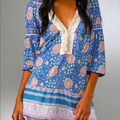 Free People Pale Blue Paisley Tunic Dress. It Has Cotton Lace Trim And Little Pearl Buttons. I’m 5’3” And It Is Easily Dress Length For Me. Loose Fit Could Accommodate Many Sizes. Size Sm. New And Never Worn But No Tags. Blue V-neck Boho Dress For Spring, Blue Floral Print Boho Dress With Short Sleeves, Blue Boho Print V-neck Dress, Blue Short Sleeve Boho Dress With Floral Print, Blue Boho Dress With Floral Print And Short Sleeves, Blue Boho Print Tunic Dress, Blue Boho Print Dress For Brunch, Blue Printed V-neck Boho Dress, Blue V-neck Boho Dress With Boho Print