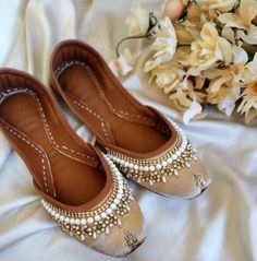 Introducing our exquisite Handmade Leather Khussa, inspired by traditional footwear from Punjab, Rajasthan, Afghanistan, and Multan. These stunning juttis are perfect for weddings, bridal showers, formal meetings, and casual outings, making them a must-have addition to your ethnic footwear collection. Craftsmanship at Its Finest Our Handmade Leather Khussa juttis are meticulously handcrafted and embroidered by skilled artisans in Pakistan. No machines involved--just pure talent and dedication. T Wedding Flats With Zari Work And Round Toe, Wedding Shoes With Dori Work For Festivals, Ankle-length Flats With Dori Work For Weddings, Wedding Shoes With Dori Work For Festive Occasion, Festive Wedding Shoes With Dori Work, Festive Wedding Shoes With Handwork And Round Toe, Wedding Flats With Dori Work, Traditional Wedding Shoes With Round Toe, Elegant Wedding Shoes With Dori Work