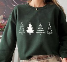 "Christmas Tree Sweatshirt, Merry & Bright Shirt, Christmas Shirts for Women, Christmas Crewneck pullover Sweater, cute Winter Holiday Tees Unisex Crewneck Sweatshirt. Loose fit for a comfortable feel. FABRICATION * 50% cotton, 50% polyester * Runs true to size SIZING This style is a Unisex Sweatshirt. If you are unsure about the size and the color you should order, please refer to the size and color chart in the pictures. CARE INSTRUCTIONS * Machine wash: warm (max 40C or 105F) * Tumble dry: lo Casual Green Holiday Sweatshirt, Casual Green Sweatshirt For Holidays, Green Holiday Sweatshirt For Fall, Green Fall Holiday Sweatshirt, Casual Green Christmas Sweatshirt, Cozy Long Sleeve Holiday Tops, Green Tops For Fall Holiday, Green Winter Sweatshirt For Gift, Green Winter Sweatshirt Gift