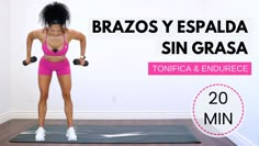 a woman in pink shorts is doing exercises on a mat with dumbbells and the words brazos y espadda sin grasa