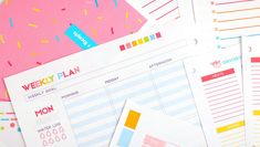 the weekly planner is laid out on top of each other with colorful papers and stickers