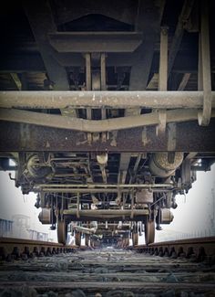 an overhead view of train tracks and the bottom part of it with lots of rust