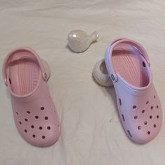 Lightweight And Water-Friendly, These Super-Comfortable Clogs Are Constructed From Signature Croslite And Can Be Customised With Jibbitz Charms. Ft. A Round Toe . Never Used Size 8m- 10w Comfortable Pink Slip-on Clogs, Comfortable Pink Clogs With Cushioned Footbed, Pink Clogs With Cushioned Footbed For Spring, Pink Flat Comfortable Clogs, Comfortable Pink Flat Clogs, Pink Non-slip Flat Clogs, Pink Flat Non-slip Clogs, Pink Closed Toe Clogs With Cushioned Footbed, Casual Flat Synthetic Clogs